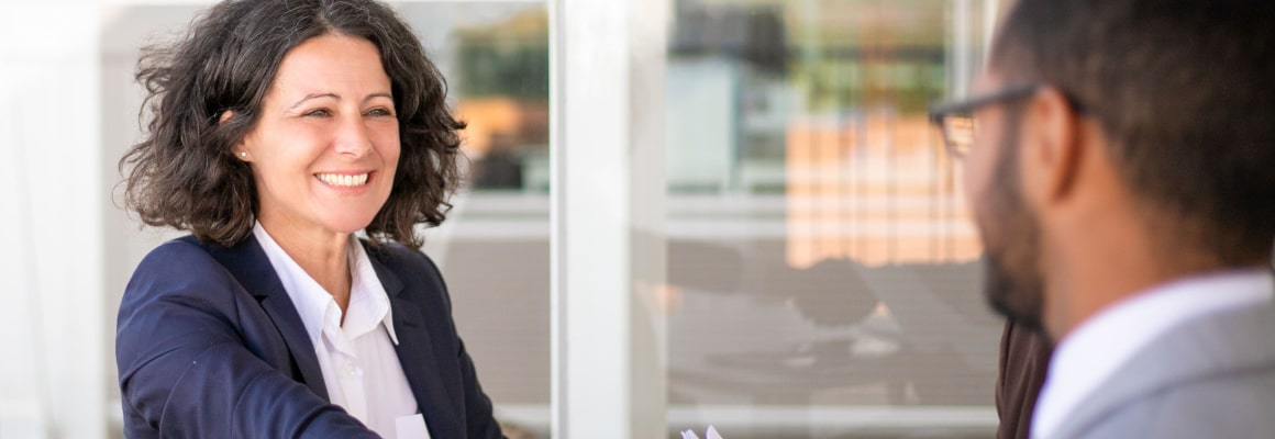 Happy female client thanking consultant