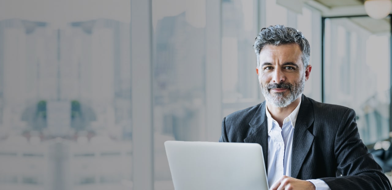 smiling lawyer wearing glasses